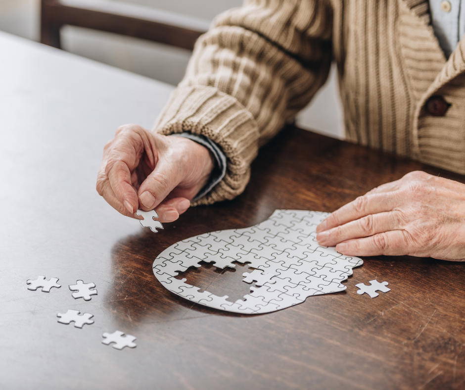 elderly man doing puzzle cognitive decline and dementia