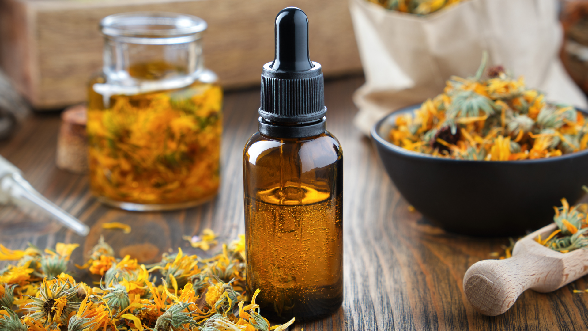 calendula skincare oil with amber dropper bottle